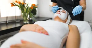 Pregnant woman receiving a prenatal facial treatment in Greenwich, CT