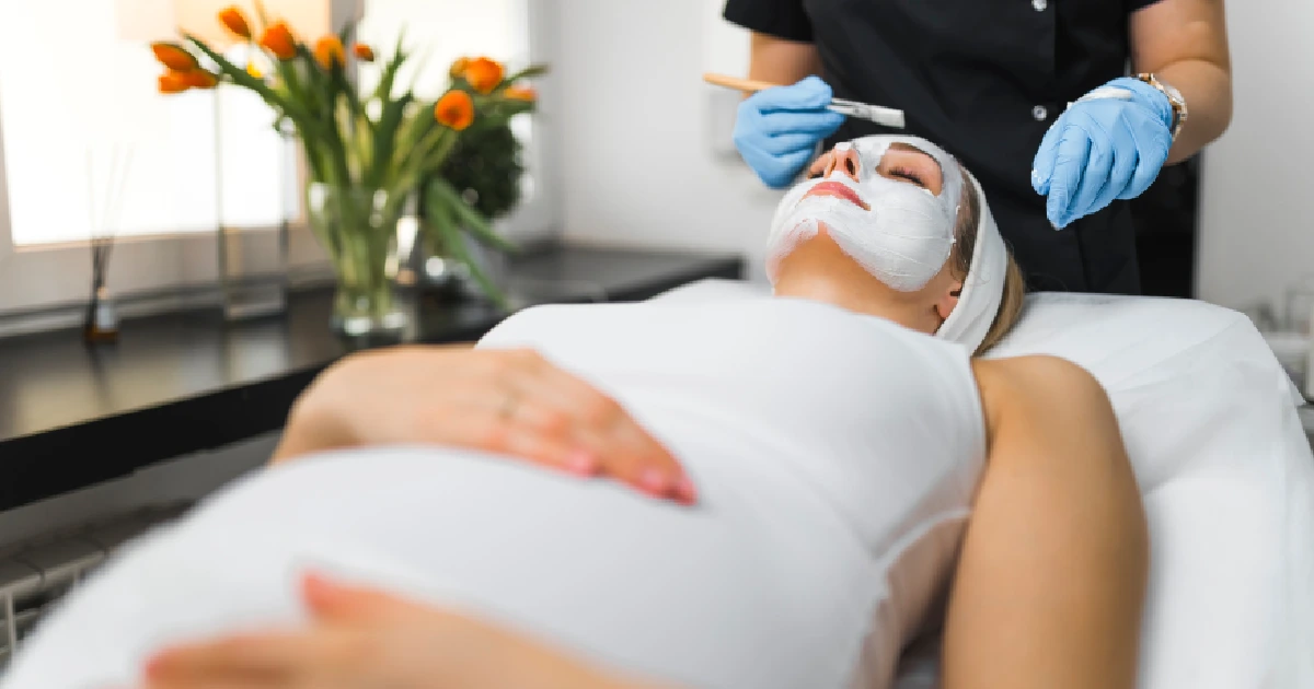 Pregnant woman receiving a prenatal facial treatment in Greenwich, CT